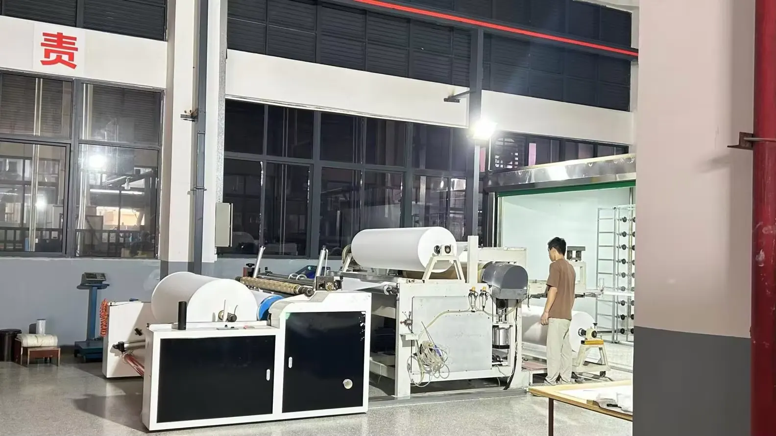 Night shift workshop equipment with converting line and white rolls