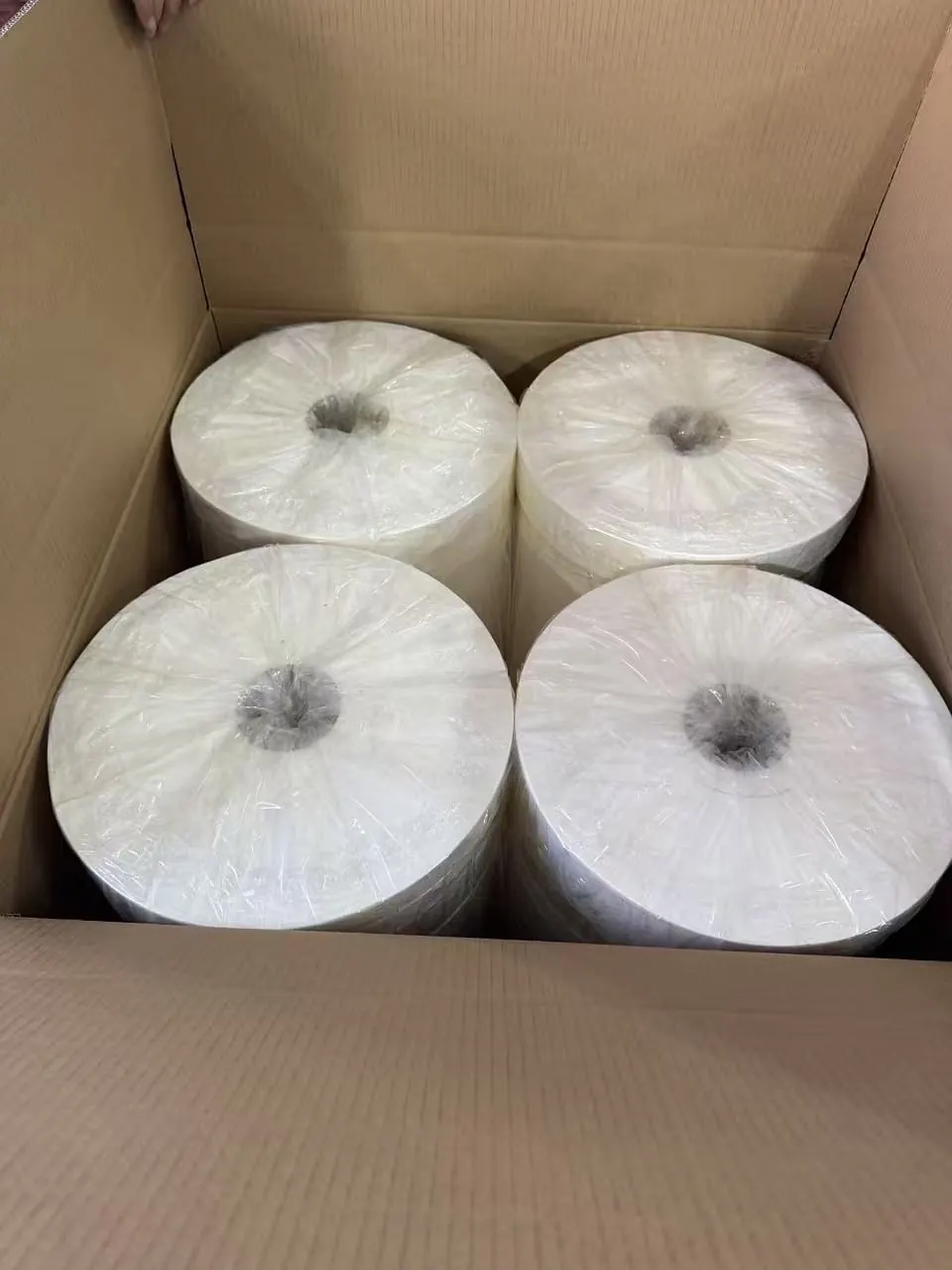 Four slit rolls packed in one carton